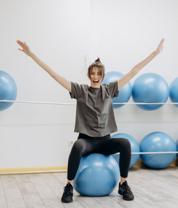 Woman feeling energetic and vibrant during a light exercise routine.